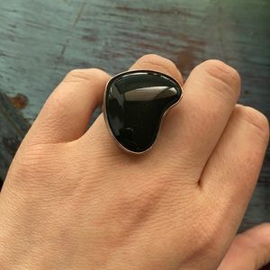 Silver ring with green stone